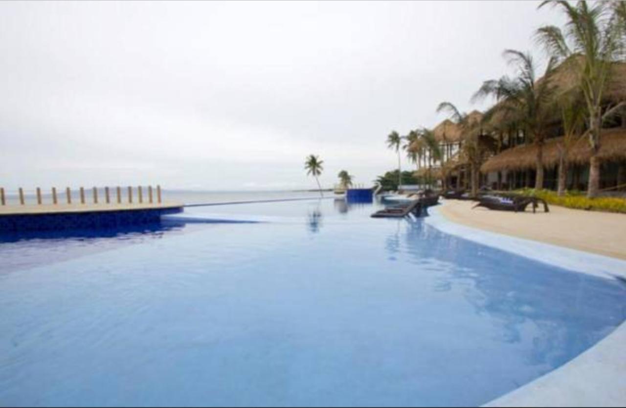 The Bellevue Resort Panglao Exterior foto Infinity pool at the Iberostar Grand Hotel, Playa del Carmen, Mexico